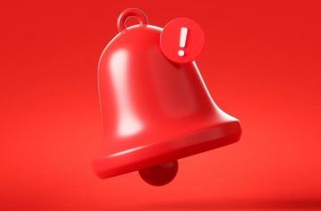 red bell with an exclamation mark
